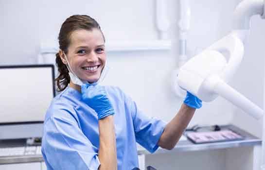 Dental hygienist smiles