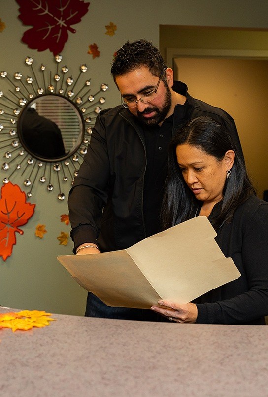 Dentists reviewing dental insurance forms