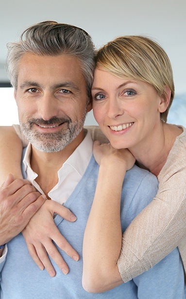 Smiling man and woman