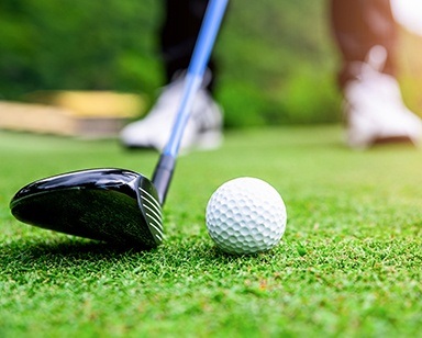 Person golfing