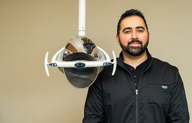 Doctor Dhaliwal in dental treatment room