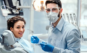 Emergency dentist in Auburn performing a checkup