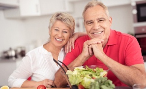 Older couple enjoying a salad together