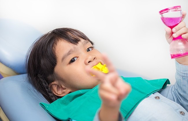 Young patient receiving fluoride treatment