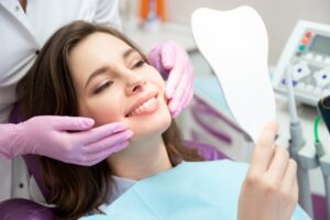 Woman enjoying her cosmetic dentistry results